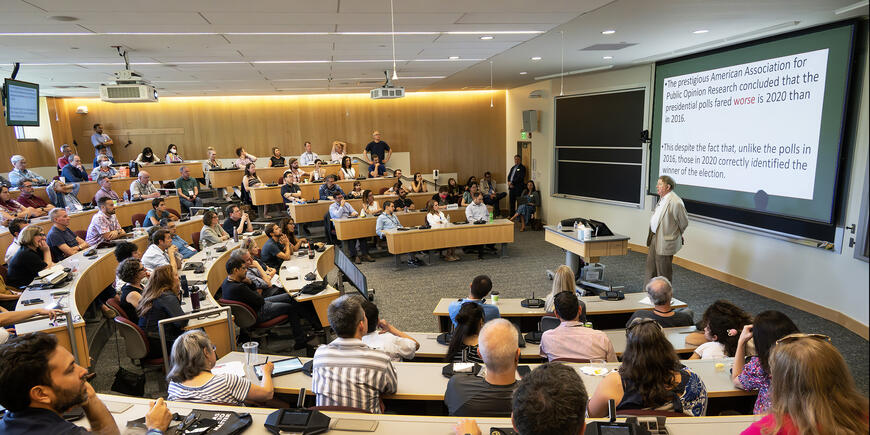 Professor Arnie Barnett speaks with alumni at MIT Sloan Reunion 2023